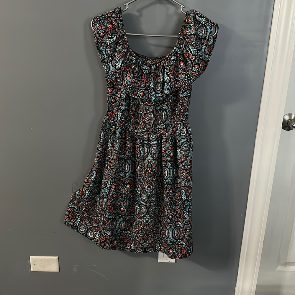 This dress is very comfortable. Blue, red some orange and pink pattern.
